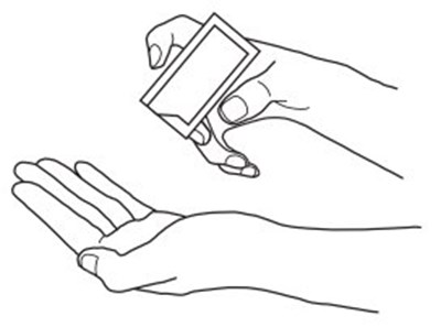 Figure B. - squeeze contents from packet into palm of hand - image 07