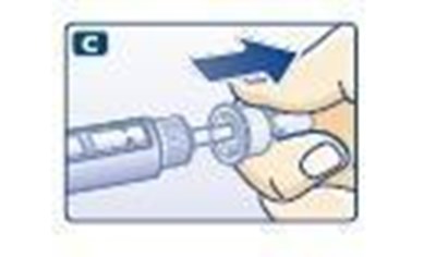 C (Pulling off the big outer needle cap)